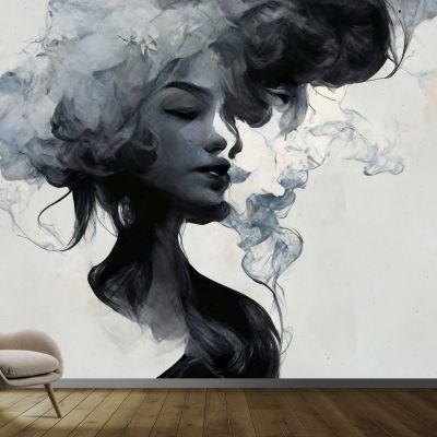 The woman in the smoke on gray background